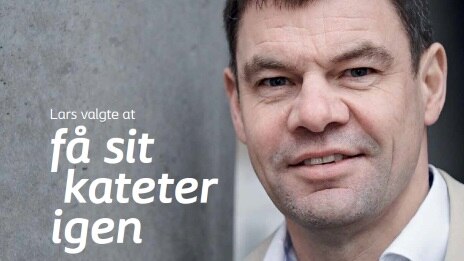 Lars i hvid skjorte og mørkt hår